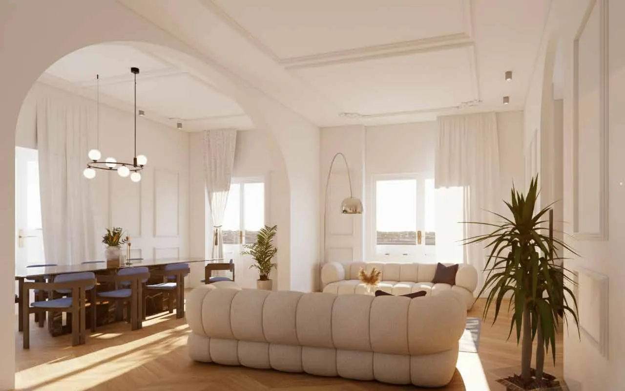 Living luminoso con parquet a spina, boiserie e doppia esposizione sul mare